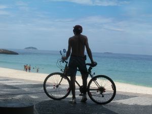 byciclist on the beach