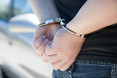 handcuffed person